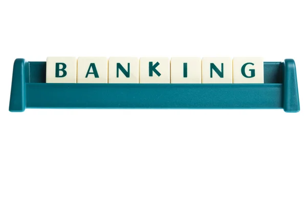 Bankowość słowo na planszy litery na białym tle — Zdjęcie stockowe