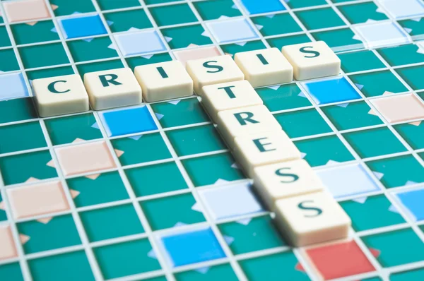 Crisis word made by letter pieces — Stock Photo, Image