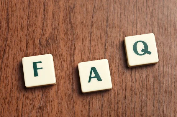 FAQ word made by letter pieces — Stock Photo, Image