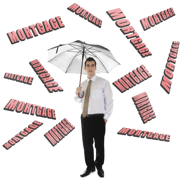 Іпотечне слово і бізнесмен з парасолькою — стокове фото