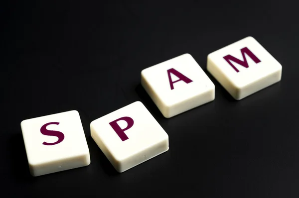Palabra de spam hecha por piezas de letras — Foto de Stock