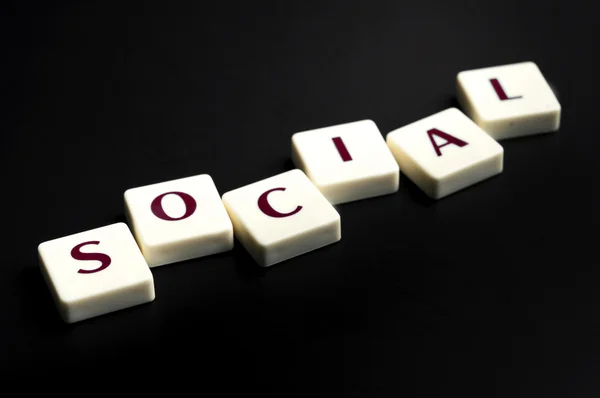 Social word made by letter pieces — Stock Photo, Image