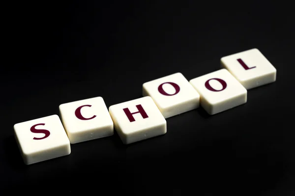 School word made by letter pieces — Stock Photo, Image