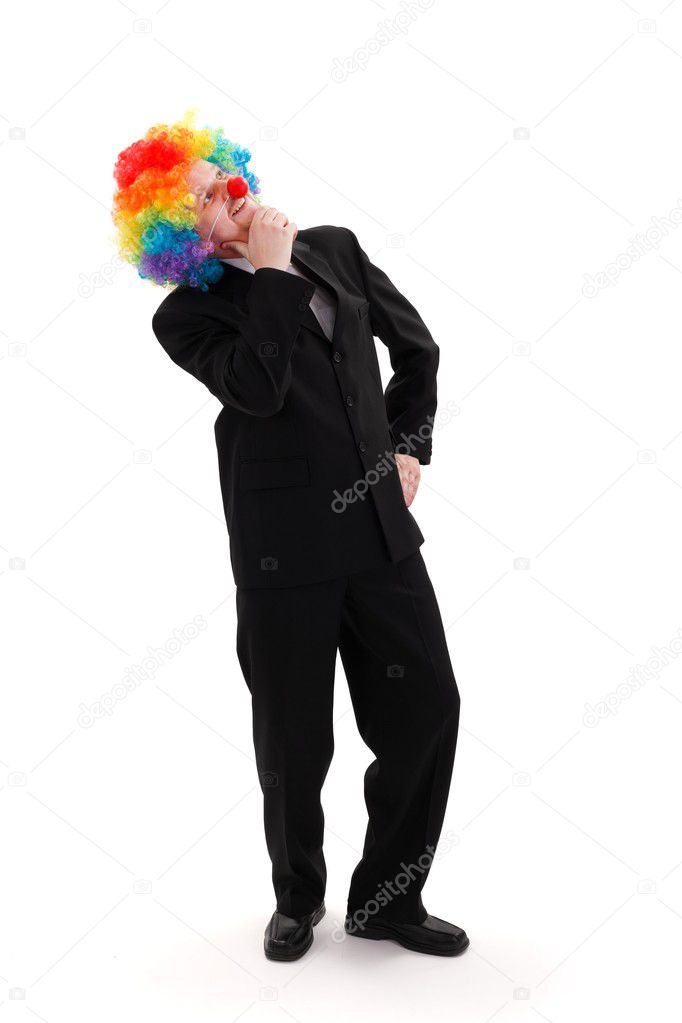Business man wearing colorful clown wig