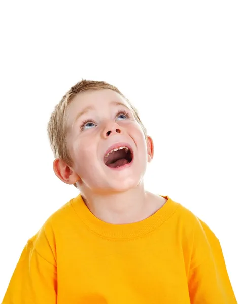 Überraschter Junge mit offenem Mund schaut auf — Stockfoto