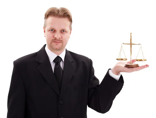 Serious lawyer holding justice scale — Stock Photo, Image