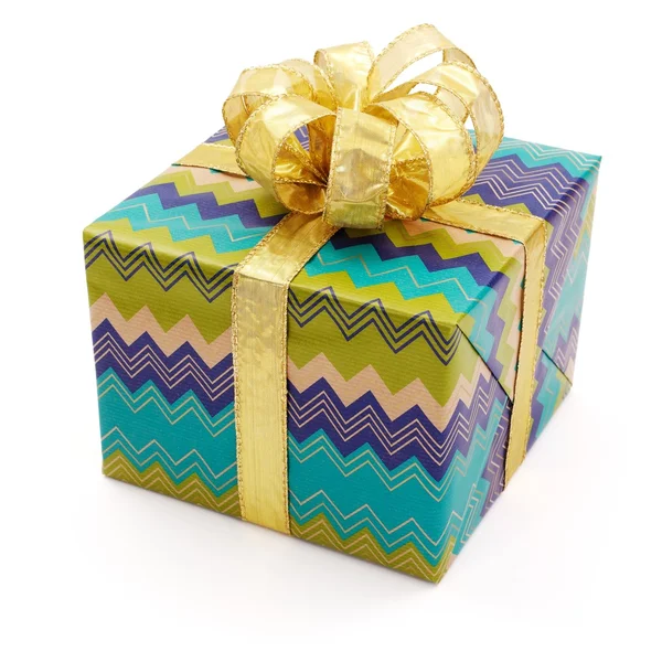 Nice gift with big golden bow — Stock Photo, Image