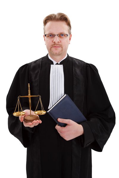 Judge with golden scale of justice