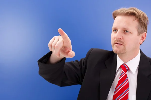 Business man pointing on copy space — Stock Photo, Image