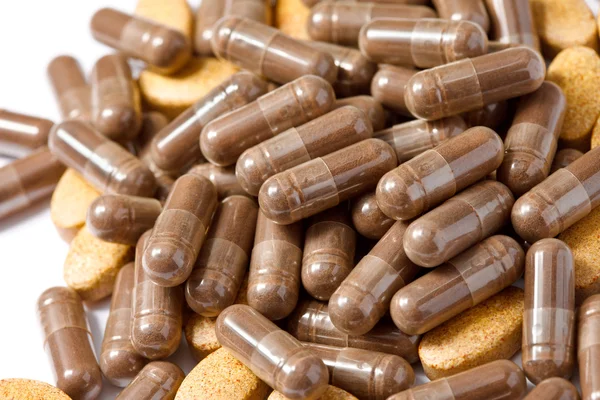 Las píldoras medicinales apilaron un montón —  Fotos de Stock