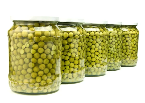 Five jars of preserved green peas — Stock Photo, Image