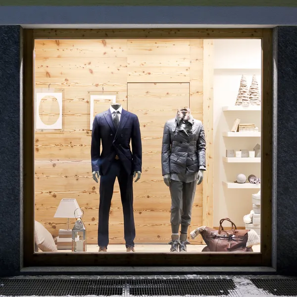 Stylish casual clothing in store window — Stock Photo, Image