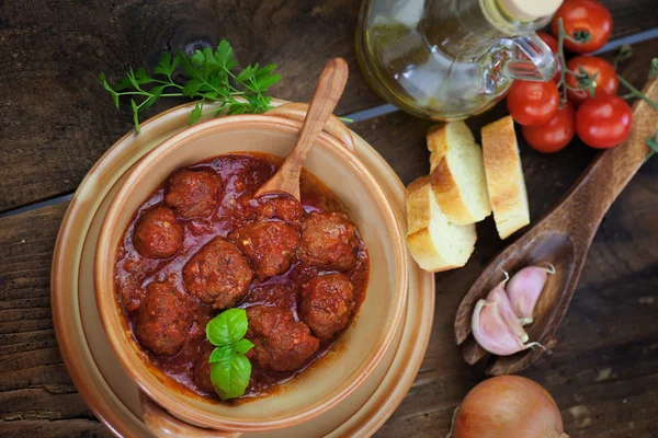 Italian cooking - meat balls with basil — Stock Photo, Image