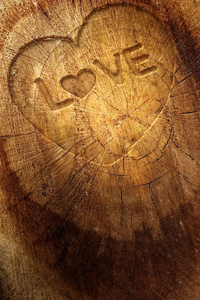 Amor texto no fundo de madeira — Fotografia de Stock