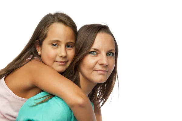 Little girl embracing her mother — Stock Photo, Image