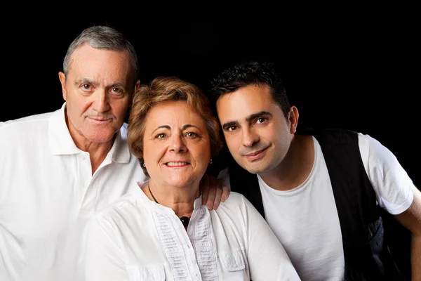 Father, mother and son isolated on black — Stock Photo, Image