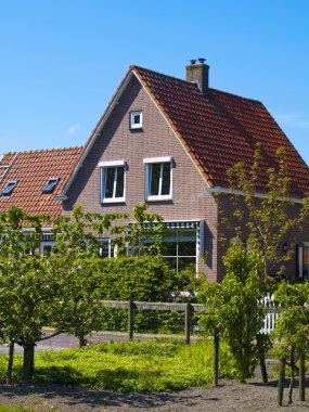 Scenics Cottages in Marken, Netherlands clipart