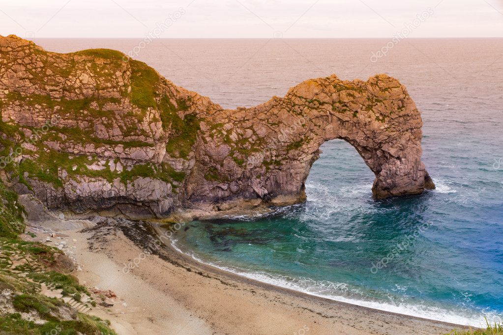 Durdle Door with beach, Jurassic Coast, Dorset, England