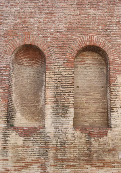 stock image Brick wall with two arches