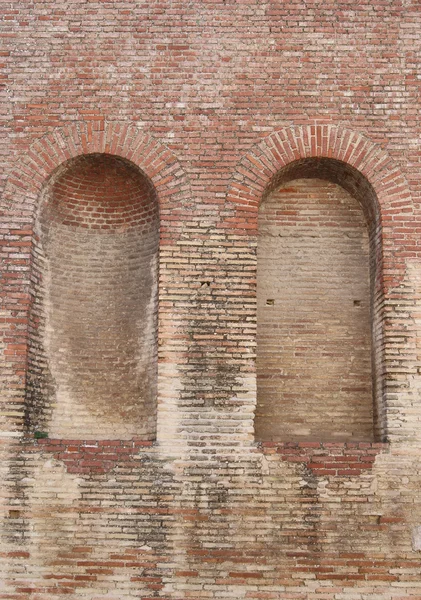 Mur en brique avec deux arches Photo De Stock