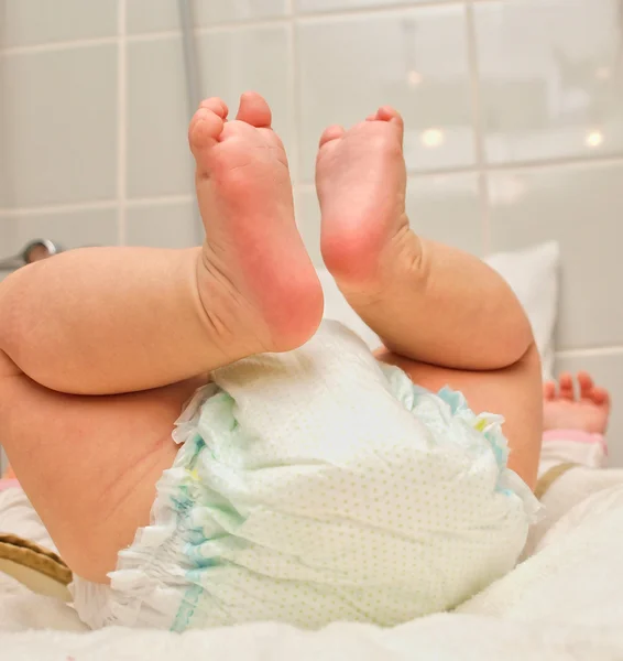 Infant on it's back, having a diaper change — Stock Photo, Image