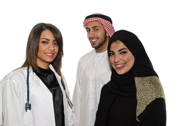 Female doctor with Arab couple clipart