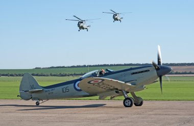 Supermarine Seafire with two Westland Lynx helicopters clipart