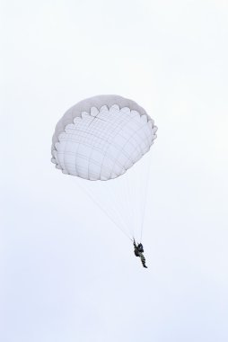 Skydiver under the parachute canopy clipart