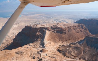 Flight over Masada clipart