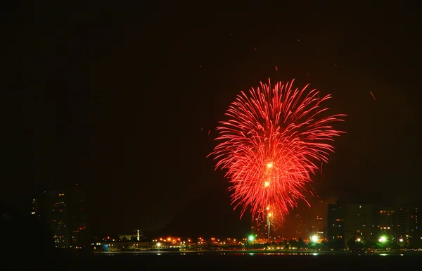 Beautiful fireworks celebrating new year on the beach — Stock Photo, Image