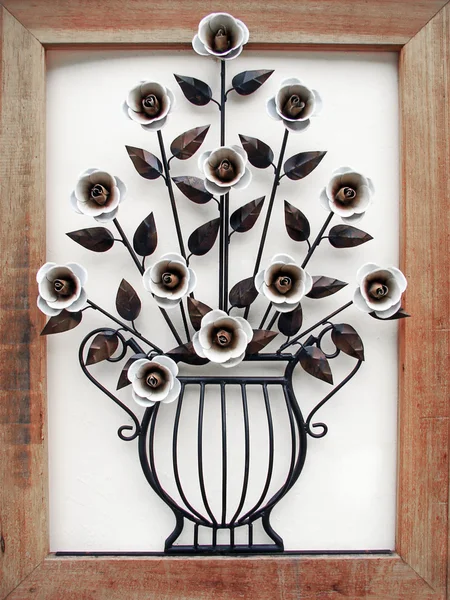 stock image Metal made flower and vase with wood frame