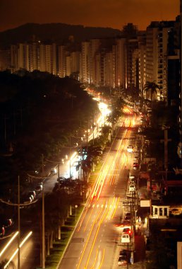 11-10-2009. During a blackout on the city of santos life continu clipart