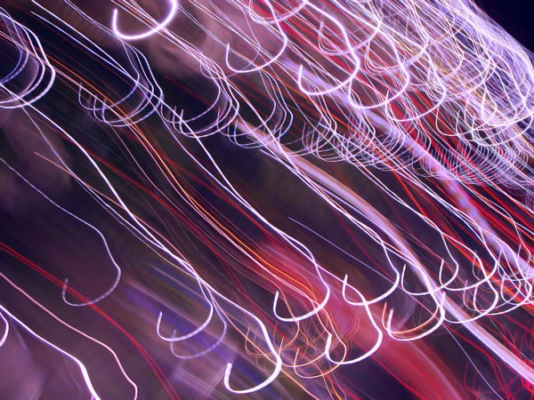 Abstract background with swuirl lights from the streets — Stock Photo, Image