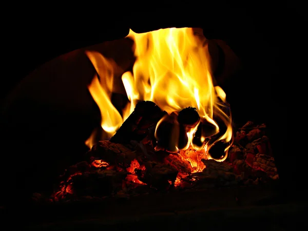 stock image Wood burning on fireplace