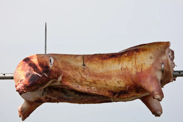 stock image Carcass pig roasts in the open air