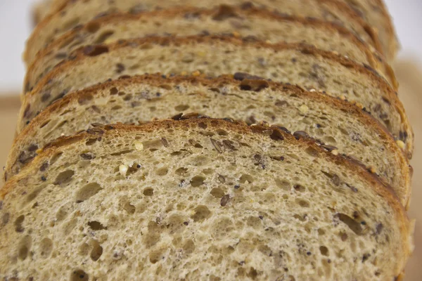 Seeded bread - macro closeup of slices — Stock Photo, Image