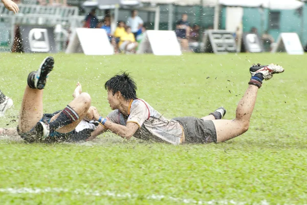 Jugadores de rugby deslizándose —  Fotos de Stock