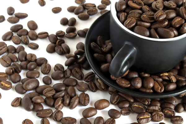 Kávová zrna v malé misce — Stock fotografie