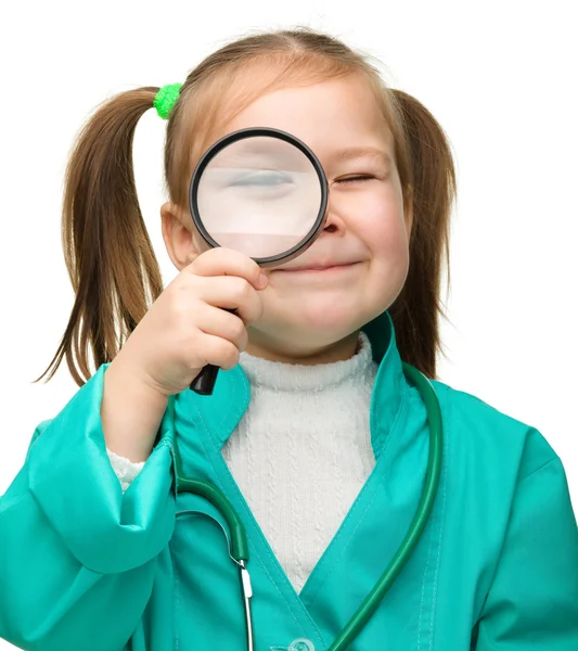 Little girl is playing doctor — Stock Photo, Image