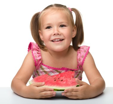 Cute little girl is going to eat watermelon clipart