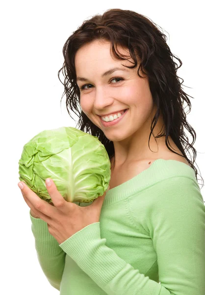 Beautiful young girl with green cabbage — Stock Photo, Image