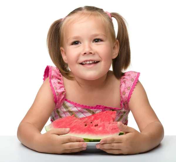 Sød lille pige vil spise vandmelon - Stock-foto