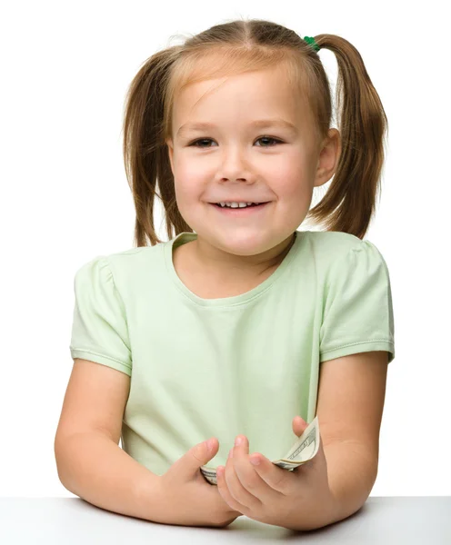 Kağıt para - dolar ile sevimli küçük kız — Stok fotoğraf