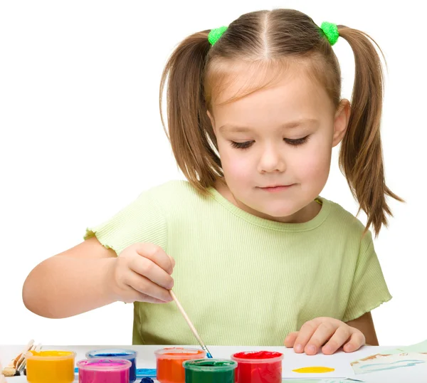 Cute cheerful child play with paints — Stock Photo, Image