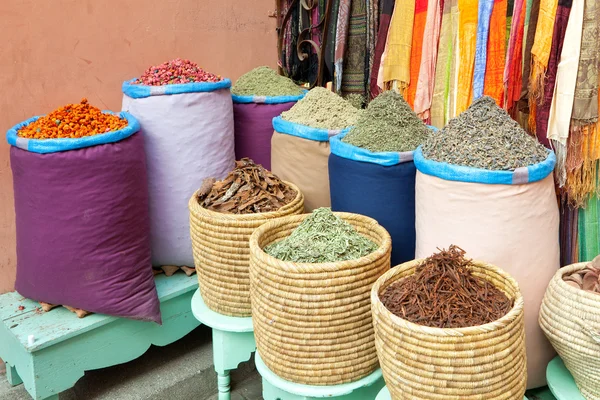 Colorful spices in bags at market
