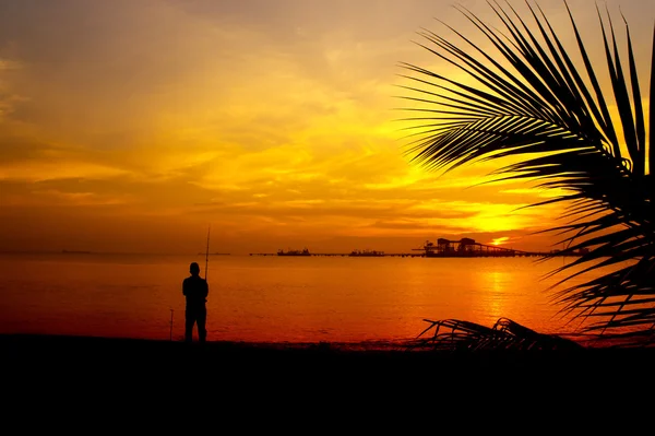 Shore anglers silhouette — Stock Photo, Image
