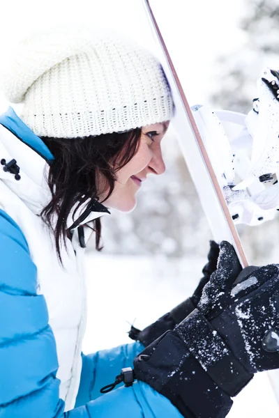 Winter woman with snowboard — Stock Photo, Image