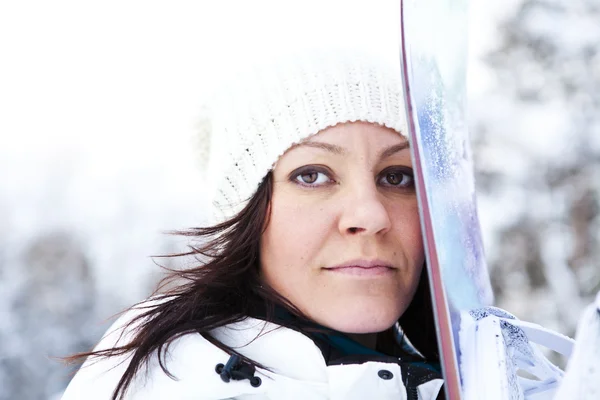Winter woman with snowboard — Stock Photo, Image