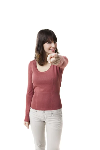 Beautiful woman pointing and smiling — Stock Photo, Image