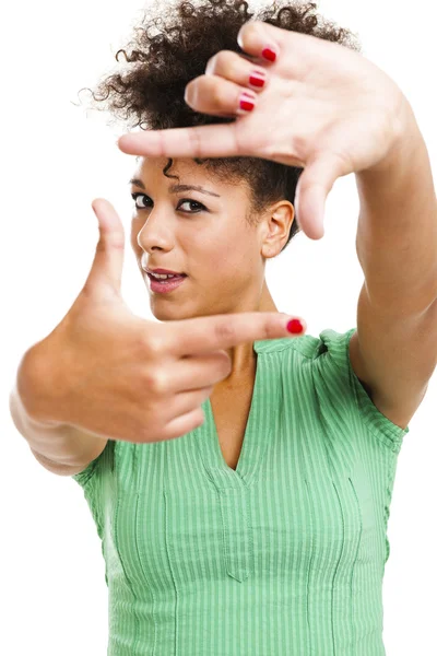 Femme faisant un cadre avec des doigts — Photo